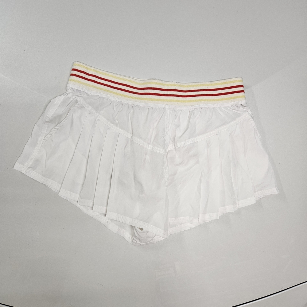 fp movement by free people white pleated shorts red and yellow waistband